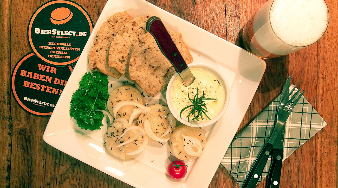 Rezept: Marinierter Käse mit Dinkelbierbrot - Biermagazin | BierSelect.de Rezept: Marinierter Käse mit Dinkelbierbrot - Biermagazin | BierSelect.de